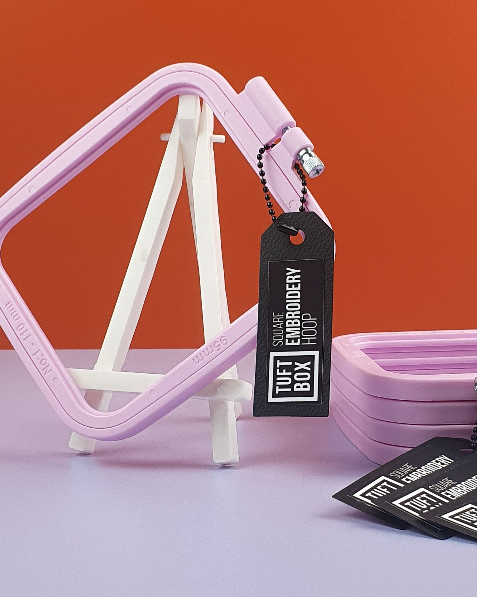 pink square hoop on stand