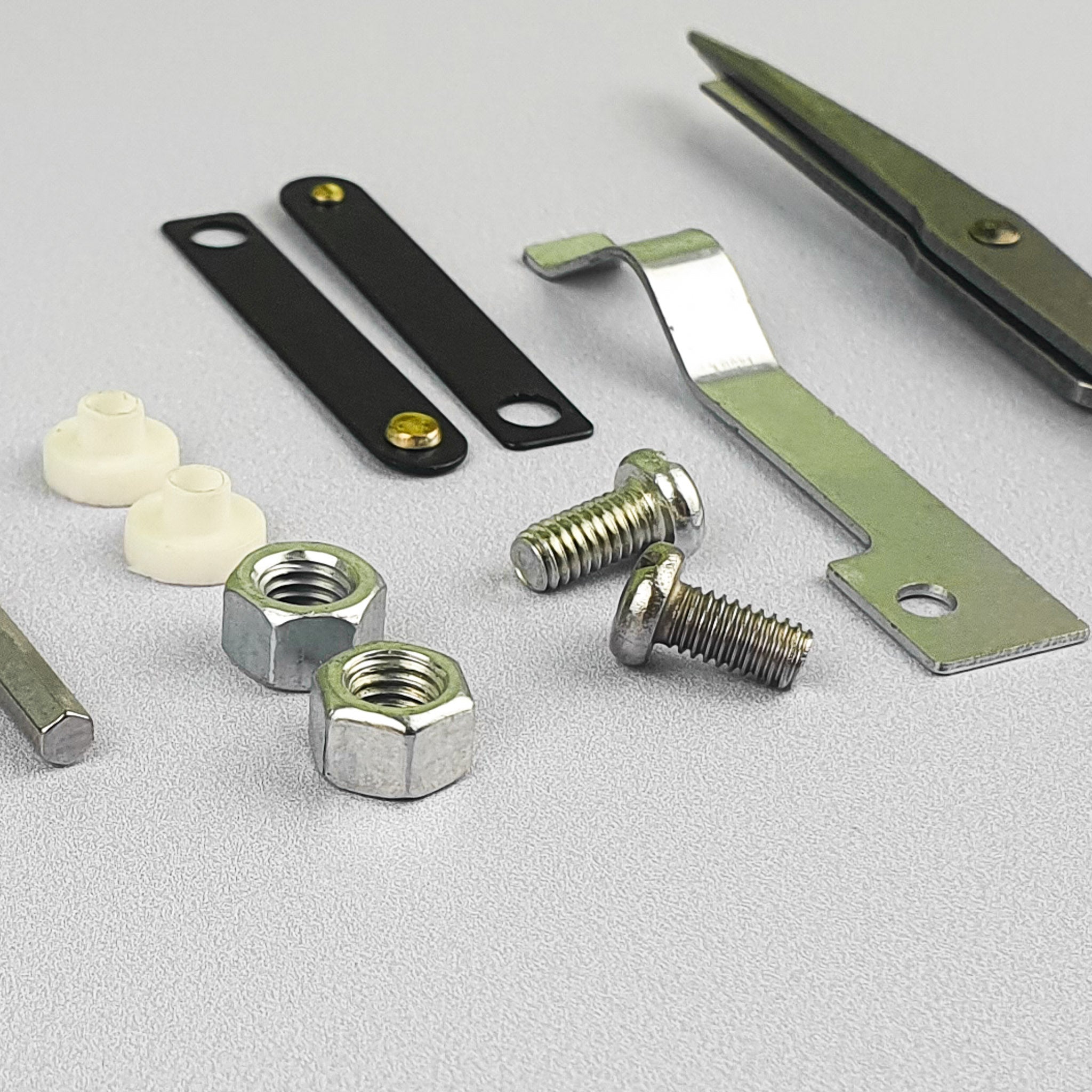 Close up of additional spare parts included with AK-I tufting machine