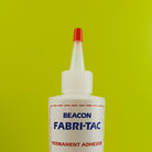 BeaconFabri-Tac top of bottle on green background