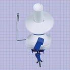 Blue and White KnitPro Yarn Winder on purple grid background