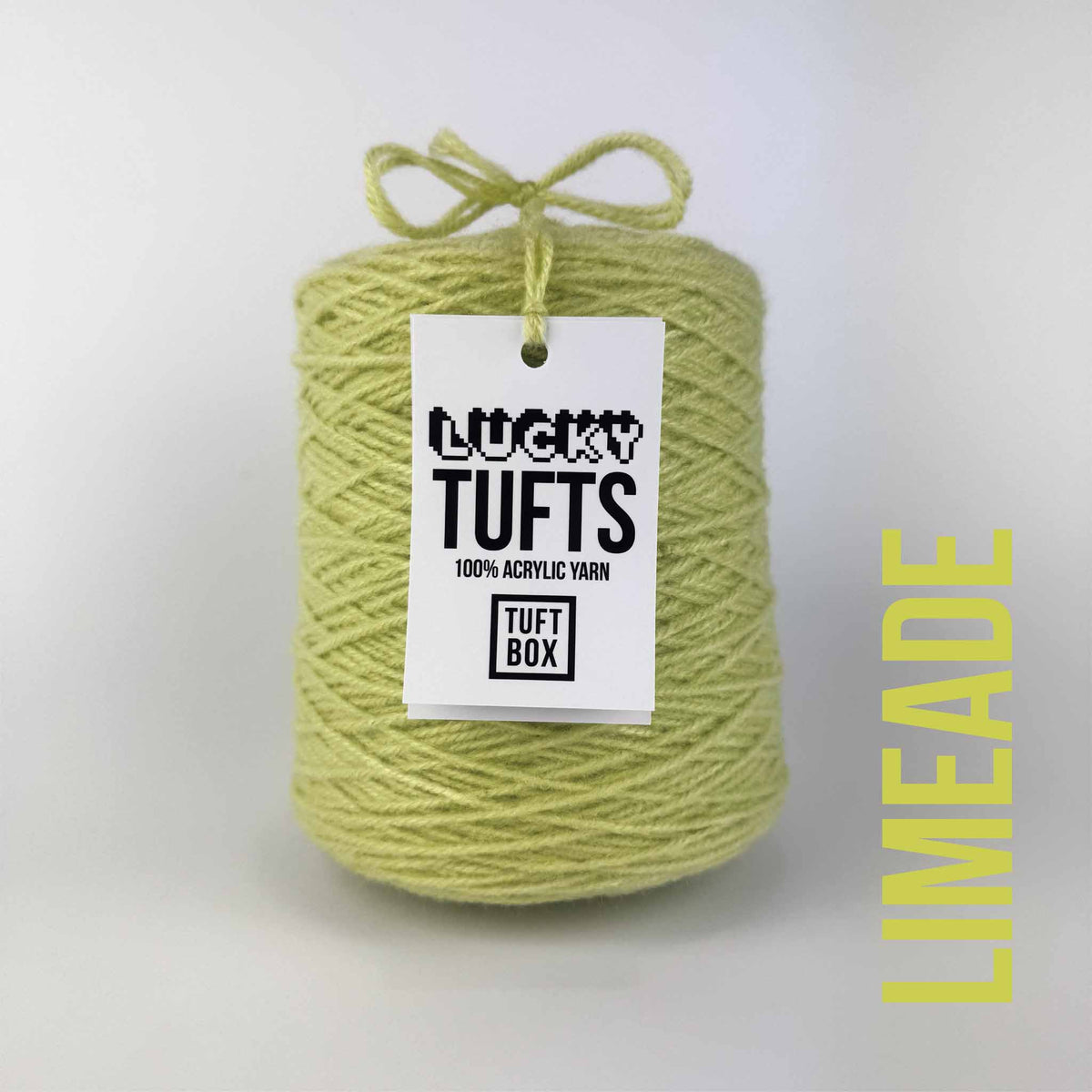 A cone of Lucky Tufts™ acrylic tufting and punch needle yarn in the colour Limeade. A bright pale green with strong yellow midtones.
