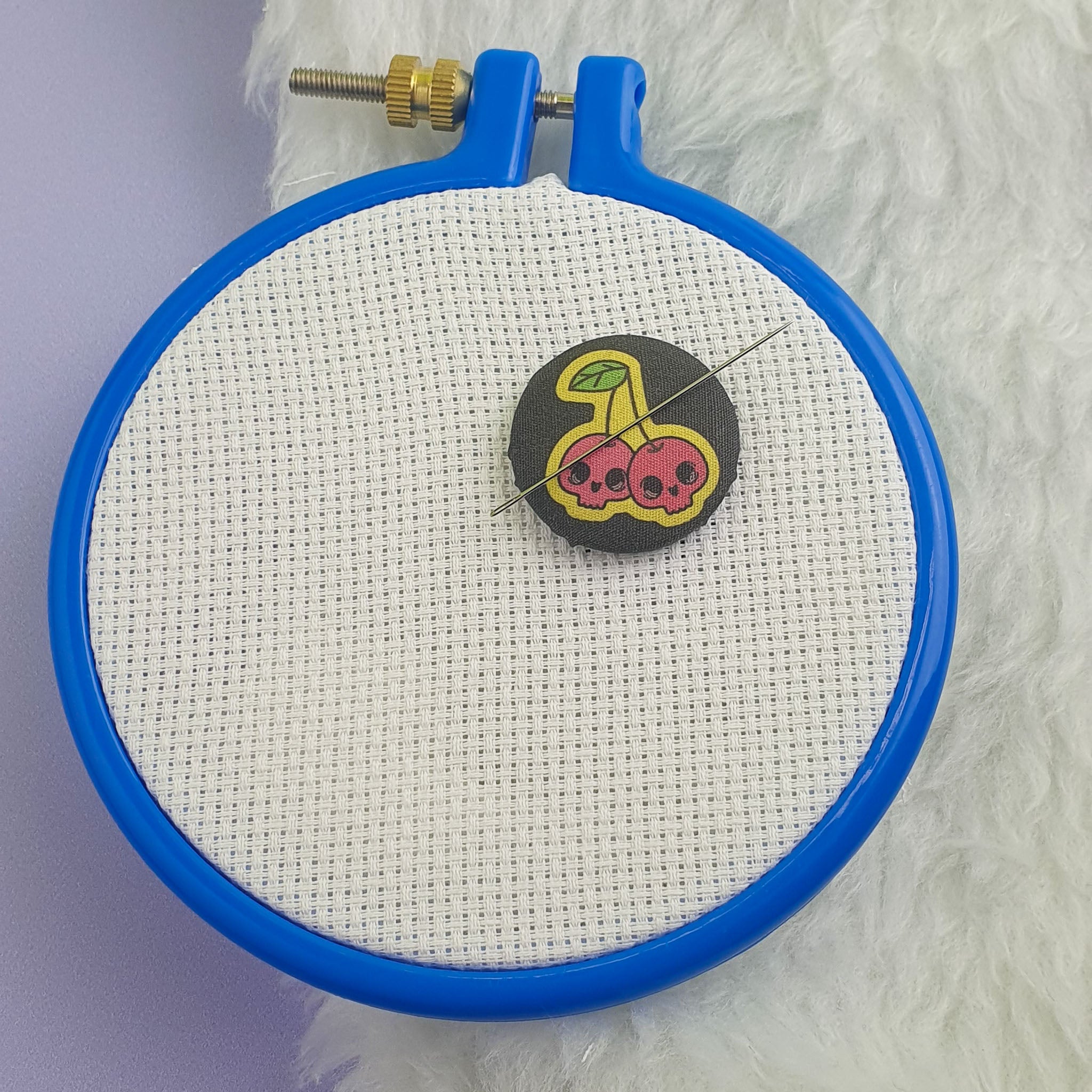 Needle Minder Cherry Skull minder in hoop
