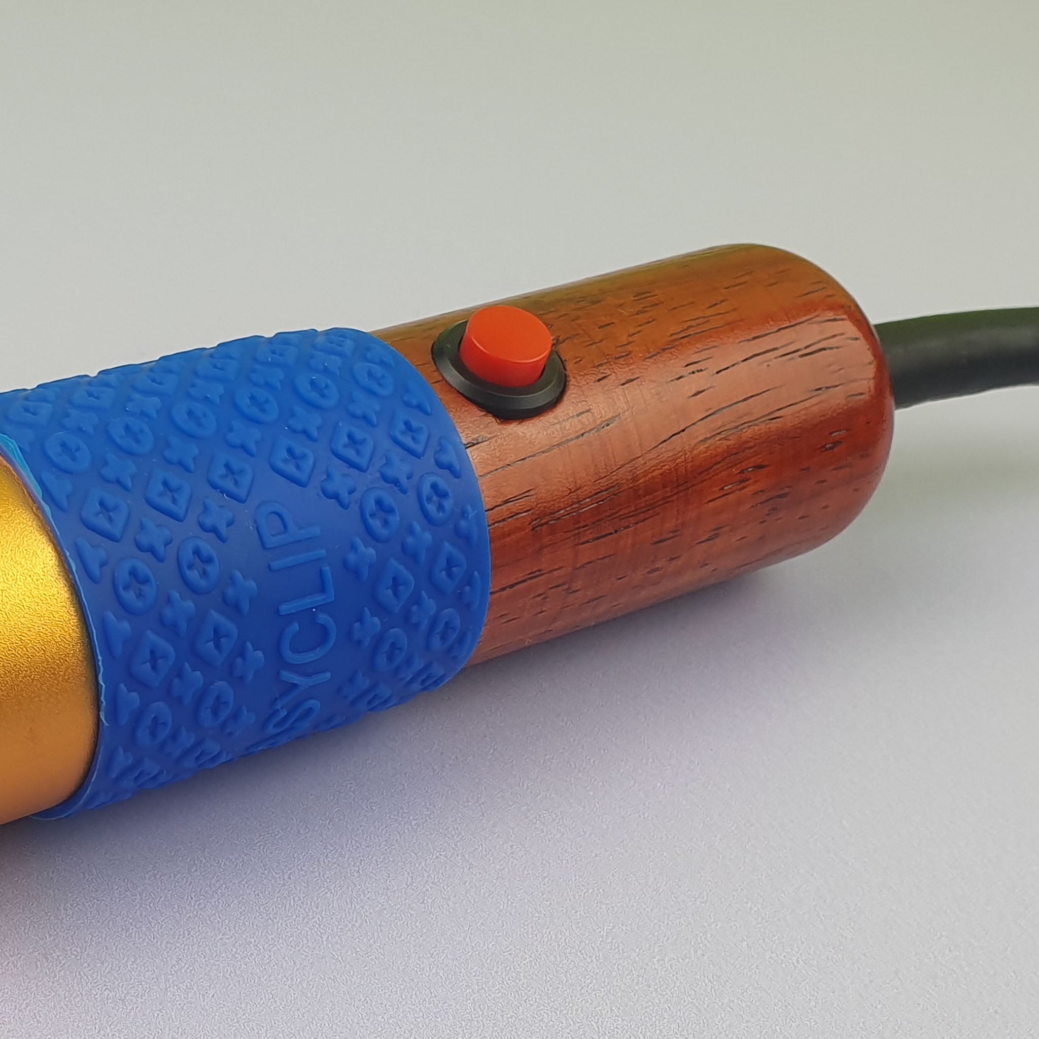 Rosewood Carver close up of on/off button
