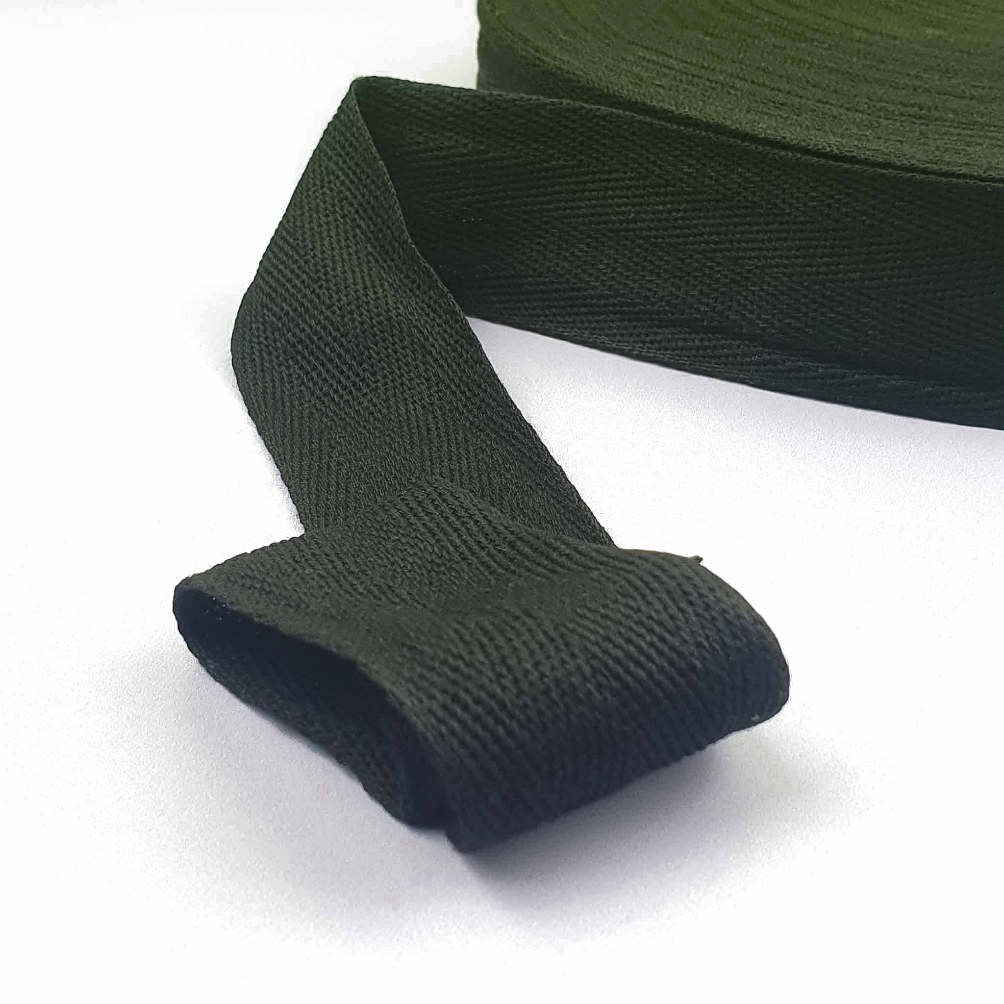 Black webbing herringbone tape on a white background