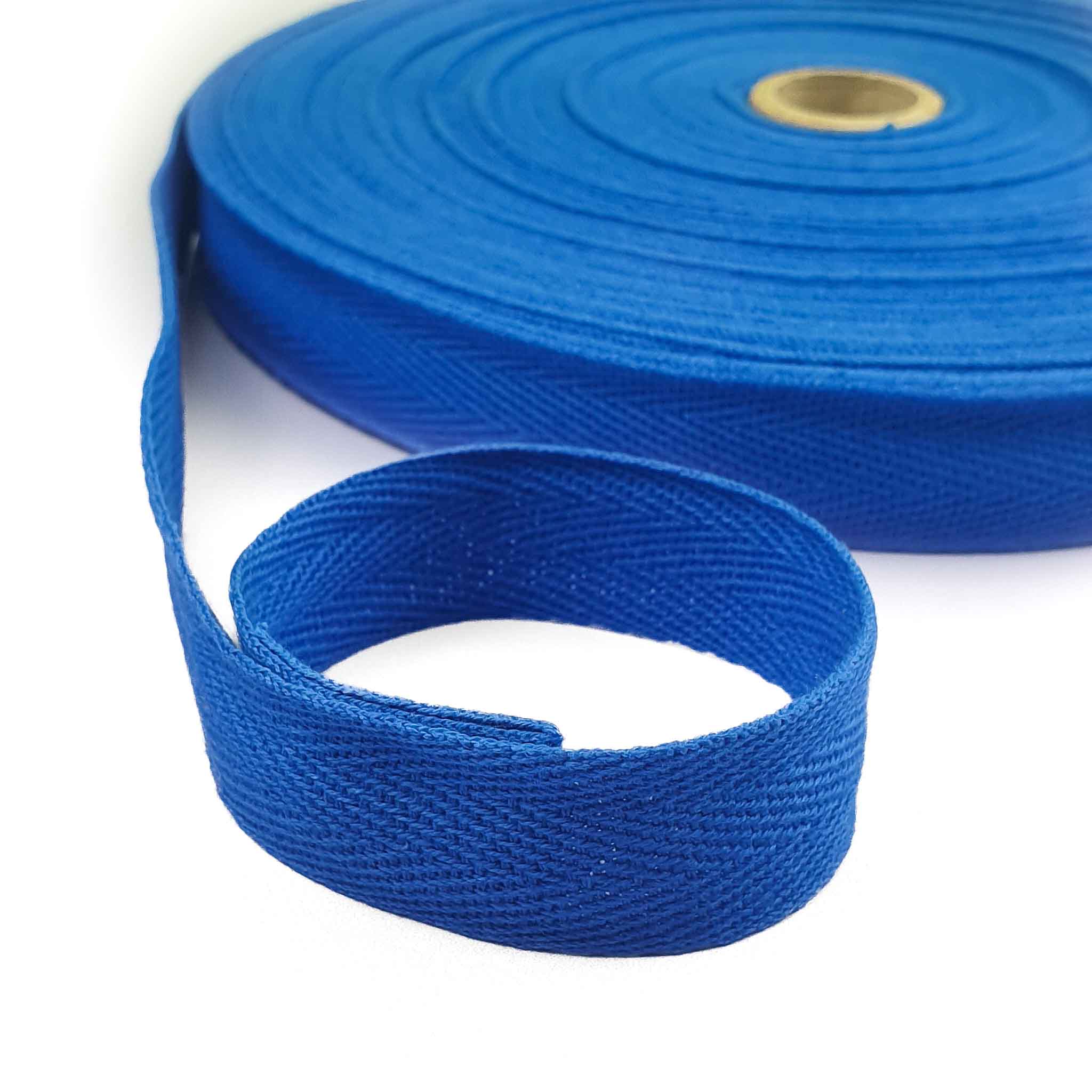 Blue webbing twill tape roll on a white background
