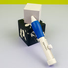 SKC Adjustable Punch Needle leaning on little concrete cube