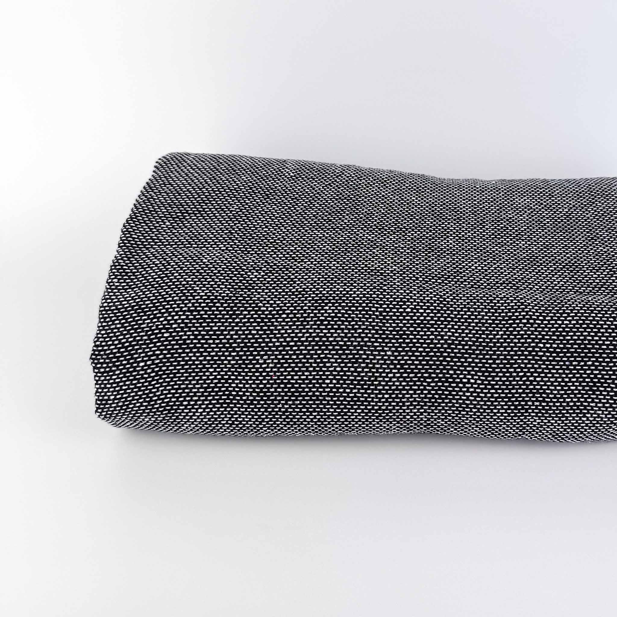 Rug Tufting Secondary Backing Fabric black and white woven final backing cloth folded on white background