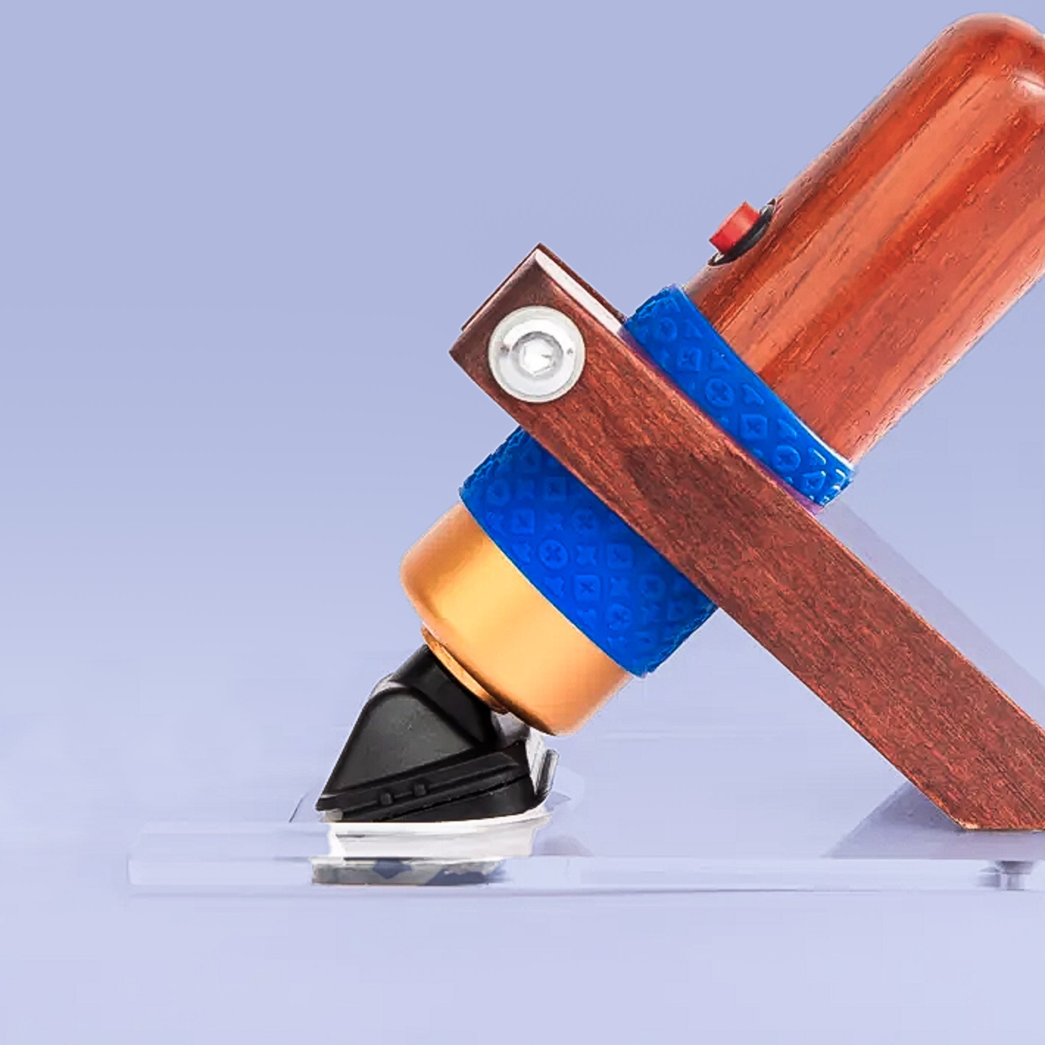 Rosewood rug carver on purple backdrop