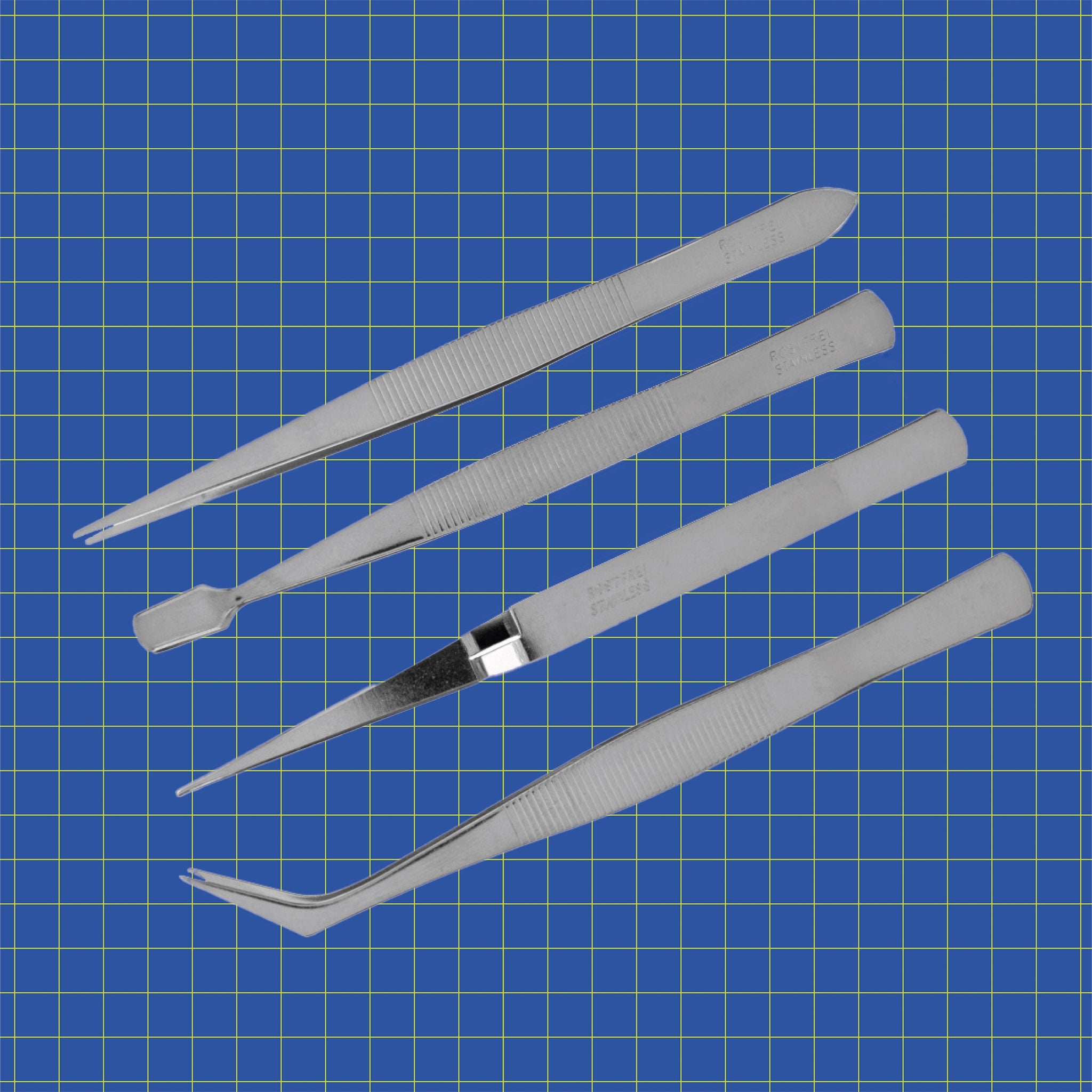 Tufting tweezer set on blue grid background