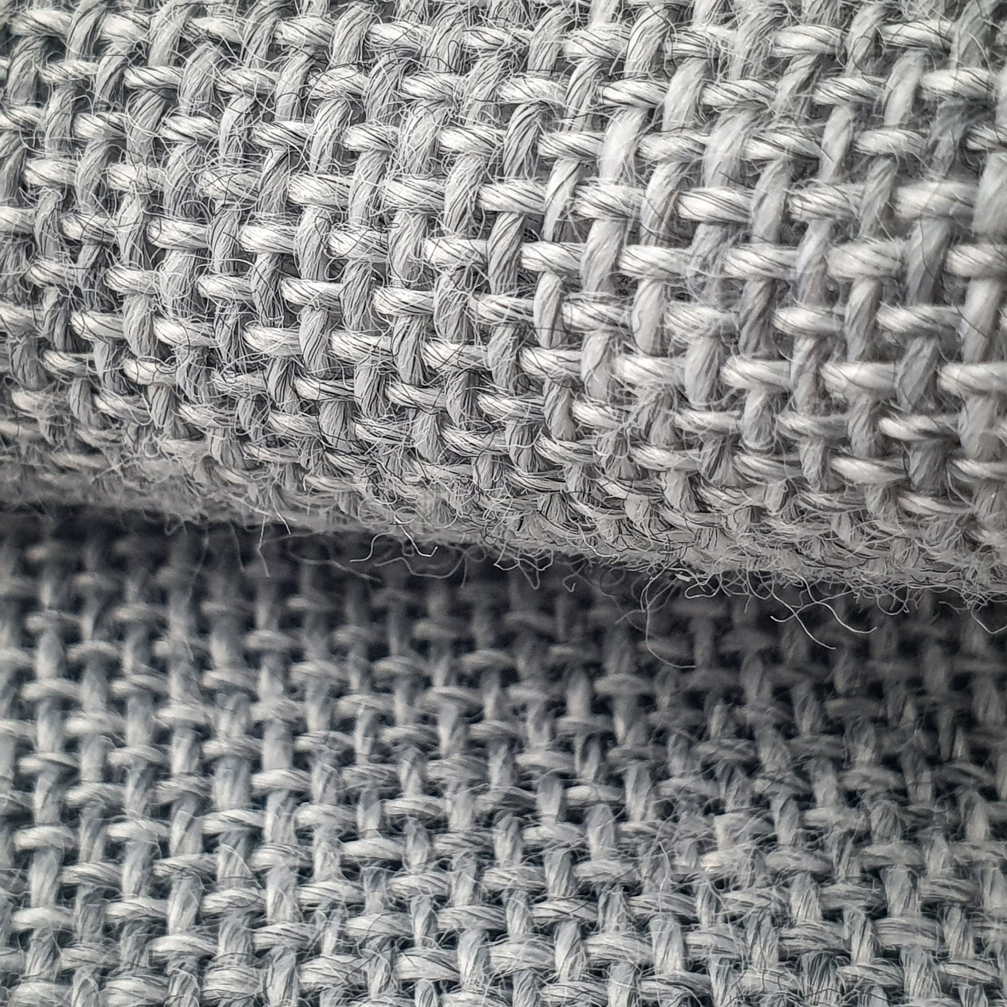 Close up of grey primary tufting fabric