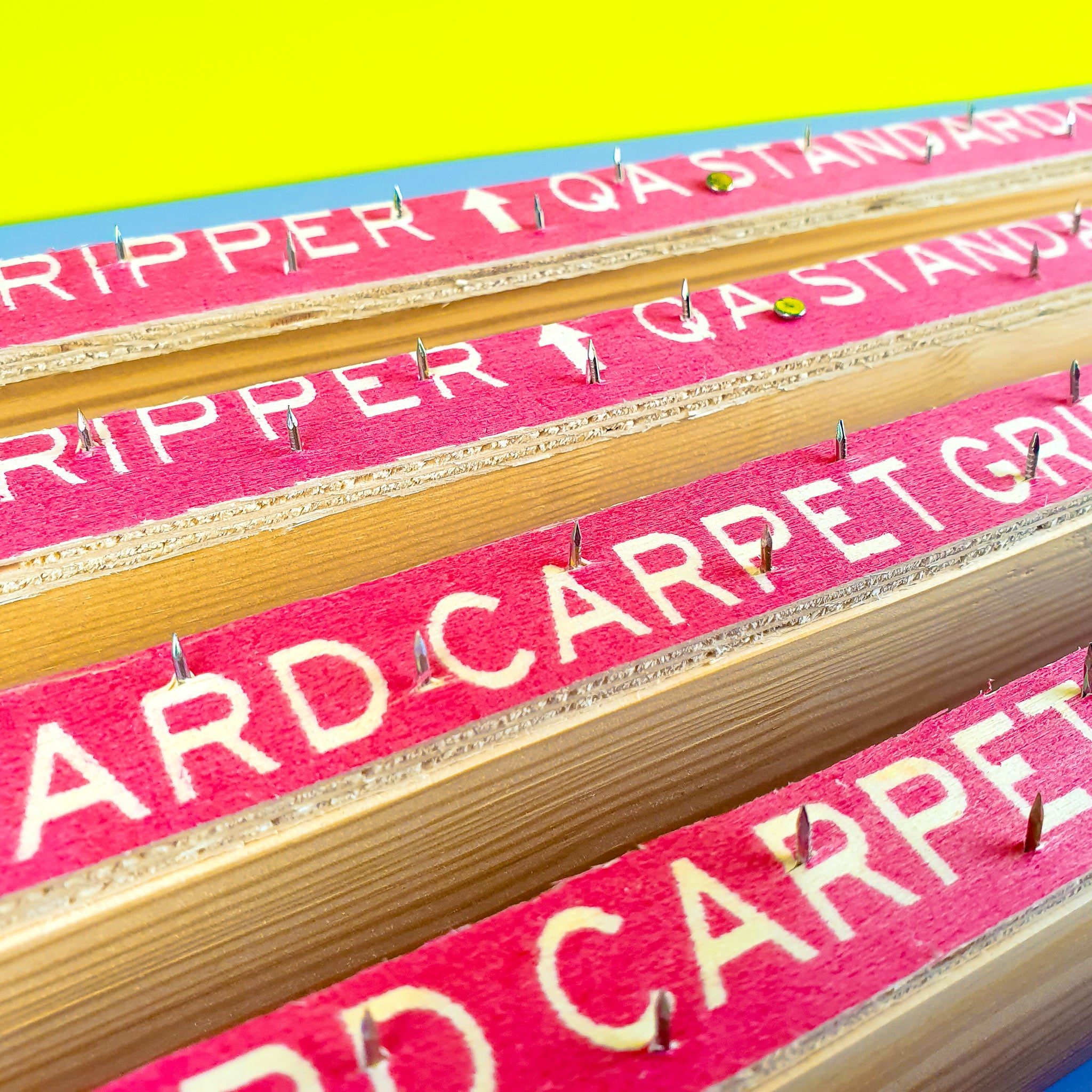 Close up of carpet gripper strips 