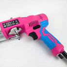 Close Up Of AK-V Tufting Gun Handle. Tuftbox Custom Colours With Fire Pink on Display. Shown On A White Background