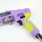 Close Up Of AK-V Tufting Gun Handle. Tuftbox Custom Colours With Glow Purple on Display. Shown On A White Background