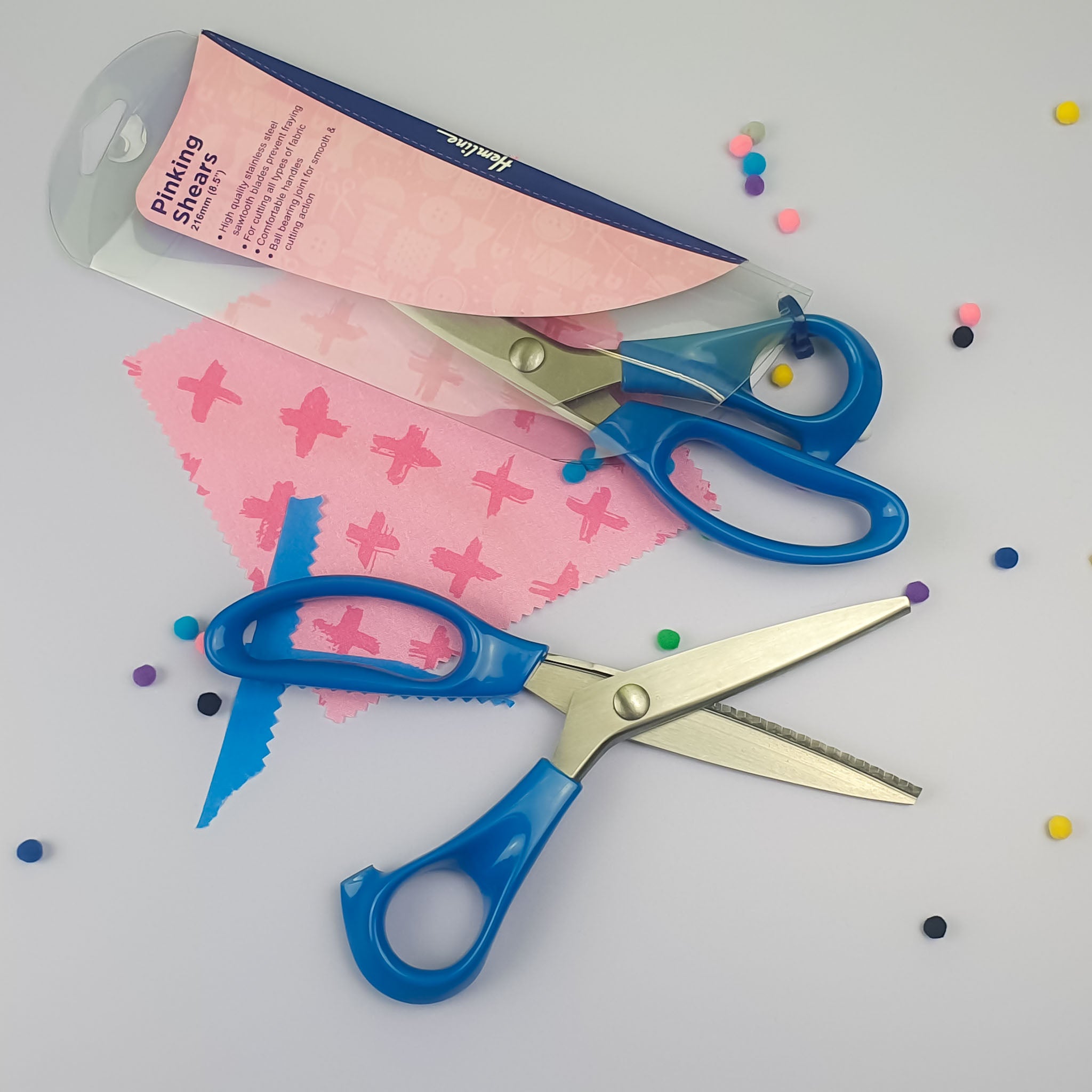 Hemline Pinking Shears with cut fabric and pom poms