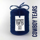 A cone of Lucky Tufts™ acrylic tufting and punch needle yarn in the colour Cowboy Tears. A dark, royal blue.