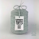 A cone of Lucky Tufts™ acrylic tufting and punch needle yarn in the colour Icicle. A whited, washed light blue.