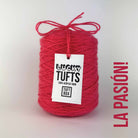 A cone of Lucky Tufts™ acrylic tufting and punch needle yarn in the colour La Pasión! A fun and vibrant pink red