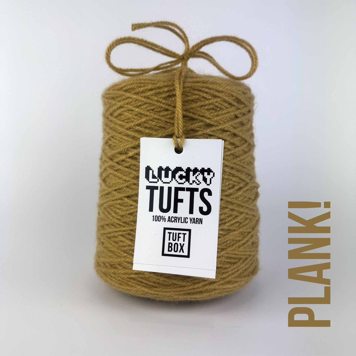 A cone of Lucky Tufts™ acrylic tufting and punch needle yarn in the colour Plank! a khaki beige brown