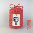 A cone of Lucky Tufts™ acrylic tufting and punch needle yarn in the colour Prawn a flamingo light coral pink 