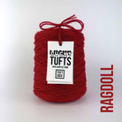 A cone of Lucky Tufts™ acrylic tufting and punch needle yarn in the colour Ragdoll a vibrant saturated lipstick red