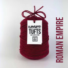 A cone of Lucky Tufts™ acrylic tufting and punch needle yarn in the colour Roman Empire a deep dark red 