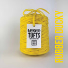 A cone of Lucky Tufts™ acrylic tufting and punch needle yarn in the colour Rubber Ducky. A bright and demanding yellow.
