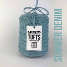 A cone of Lucky Tufts™ acrylic tufting and punch needle yarn in the colour Summer Denim. A strong pastel blue.